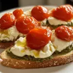 Pesto Burrata Crostini with Blistered Cherry Tomatoes 3 Pesto Burrata Crostini