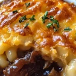 Tender Oxtail Pot Pie with Mac & Cheese Crust